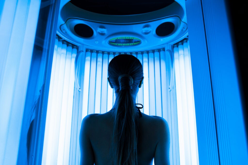 Woman preparing her skin for UltraClear Laser treatment by following pre-treatment guidelines.